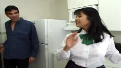 Mika Tan in socks masturbating in the kitchen